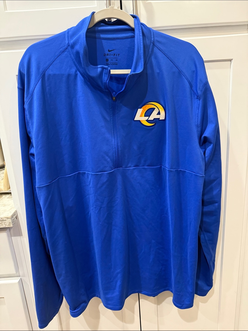 Nike Royal Blue Rams Lightweight Quarter-Zip Pullover with LA Rams Logo